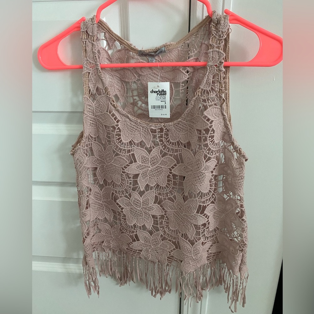 Crochet top. Size small. Light pinkish-beige in color.